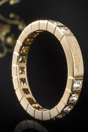 Bague Cartier Lanières Mémoire sertie de diamants, or jaune